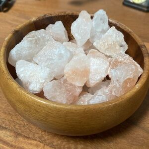 Vintage acacia wooden bowl full of rock salt
